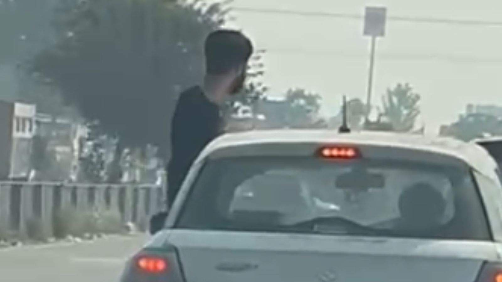 Shocking Car Stunt in Jalandhar: Youth Hangs Out of Window at 100 kmph on PAP Highway
