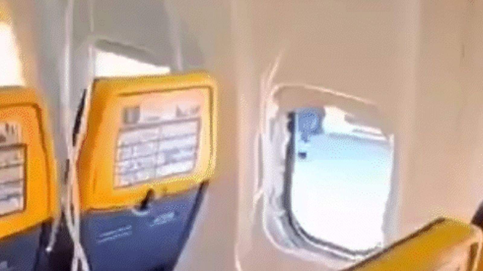 Flight window breaks at 30,000 feet, passenger's head sucked out; wife and fellow passengers save his life.